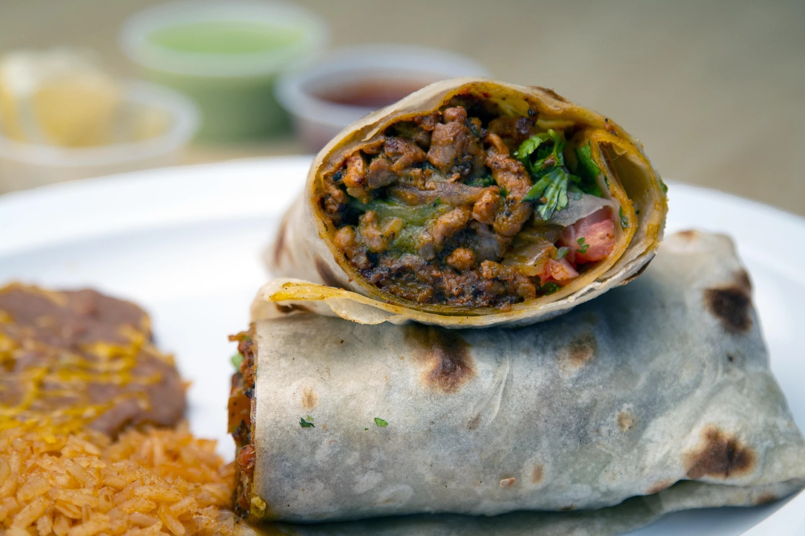 Cut burrito with a generous filling